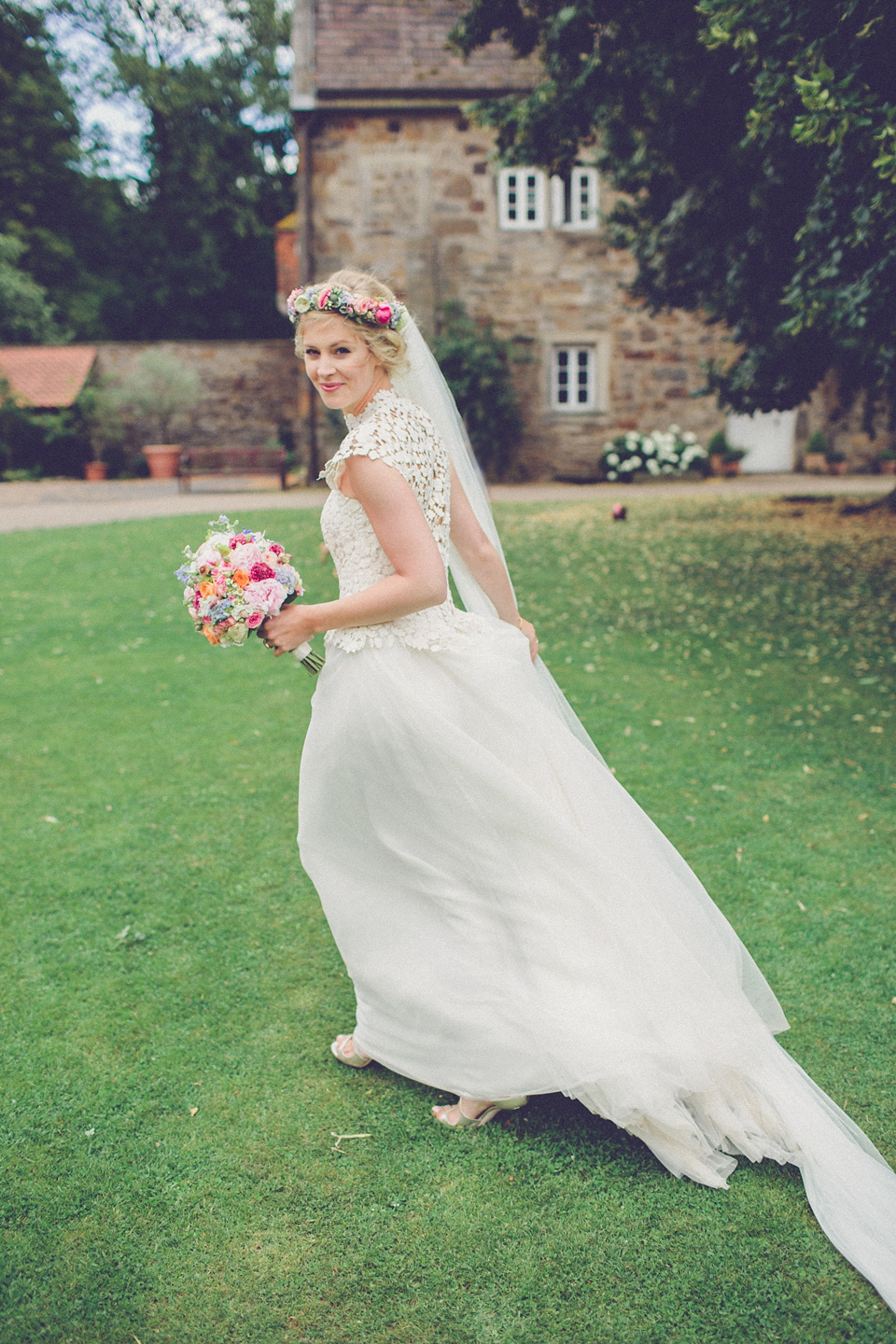 Effortless Elegance - A Raimon Bundó Bride and Colourful Floral Crown. Photography by Chris Spira.