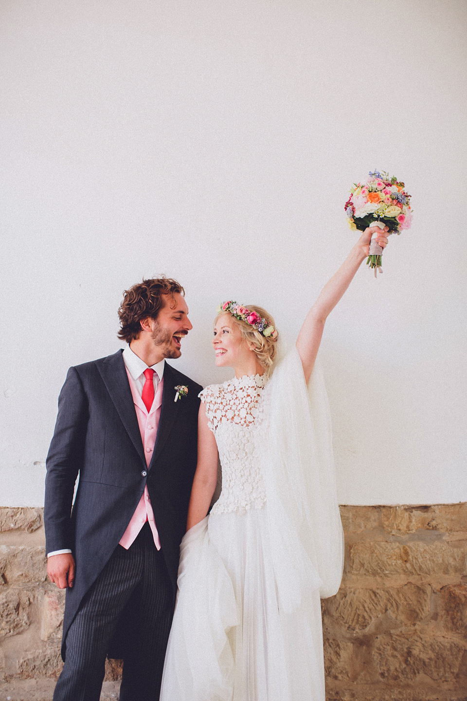 Effortless Elegance - A Raimon Bundó Bride and Colourful Floral Crown. Photography by Chris Spira.