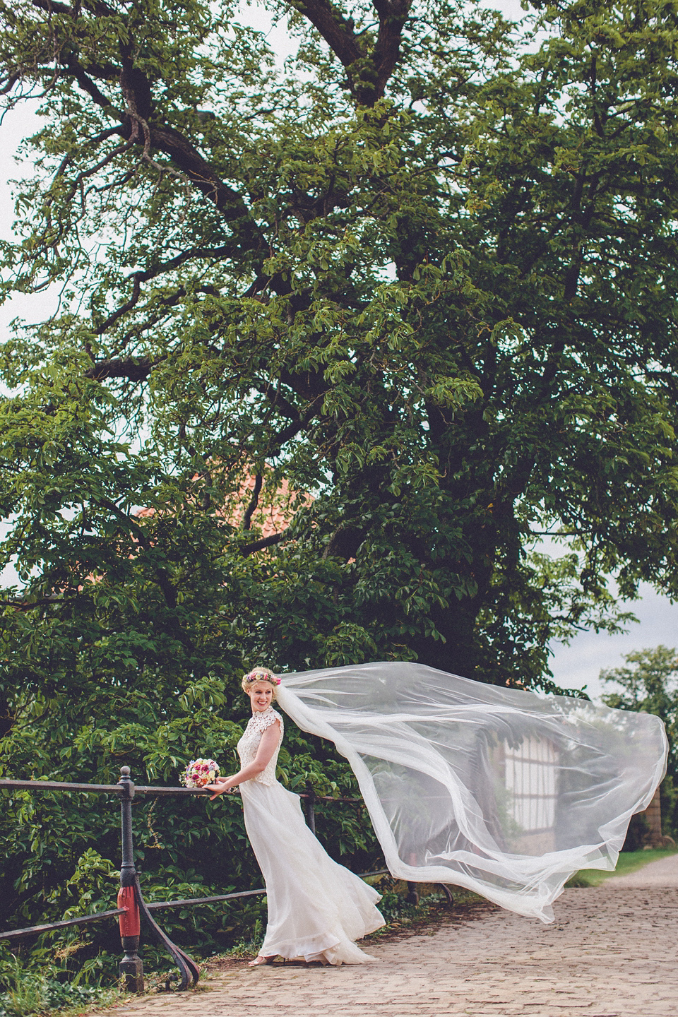 Effortless Elegance - A Raimon Bundó Bride and Colourful Floral Crown. Photography by Chris Spira.