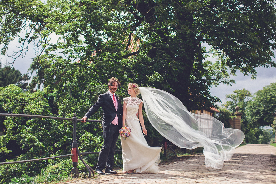 Effortless Elegance - A Raimon Bundó Bride and Colourful Floral Crown. Photography by Chris Spira.