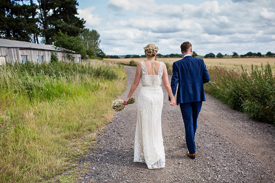 A Rustic Barn Wedding With a Bride in Catherine Deane and a Dried Flower Crown. Photography by Jo Hastings.