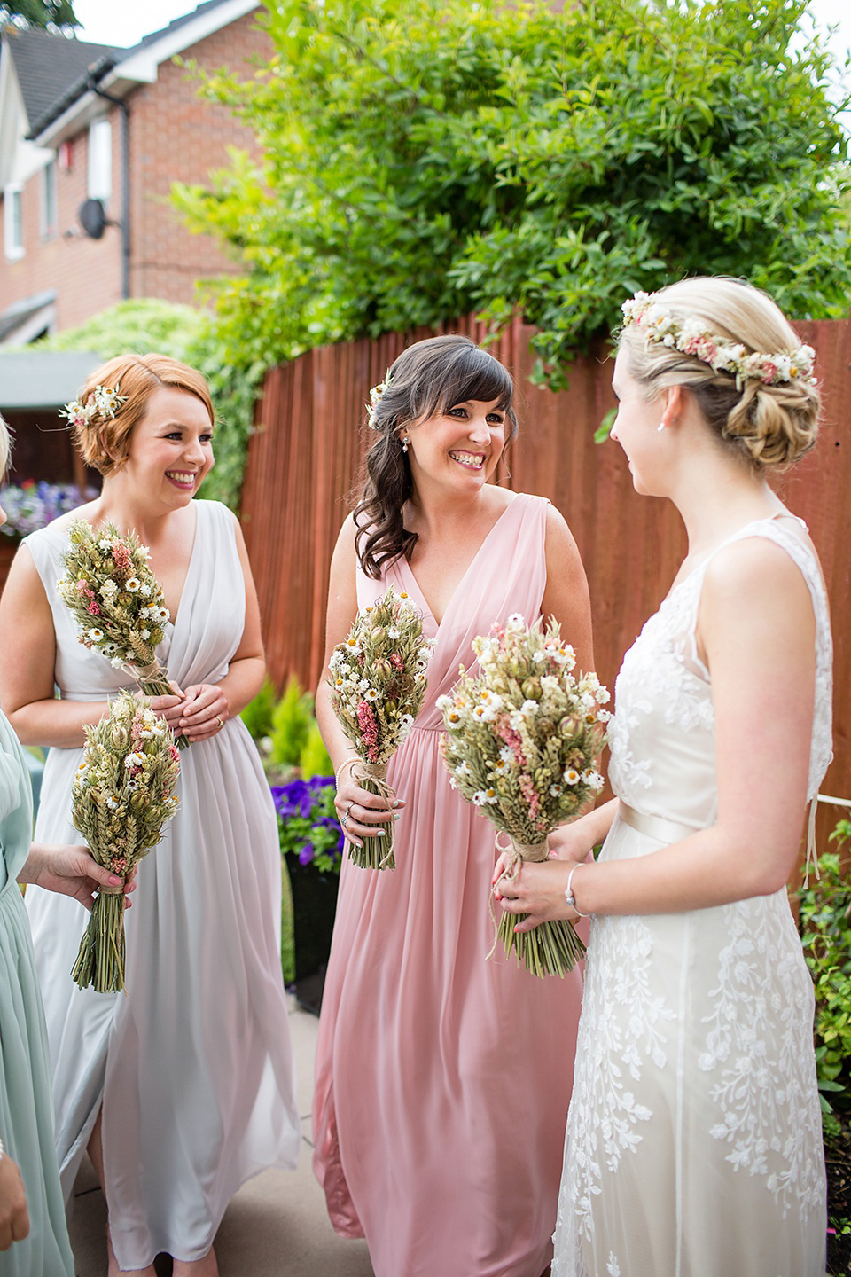 A Rustic Barn Wedding With a Bride in Catherine Deane and a Dried Flower Crown. Photography by Jo Hastings.