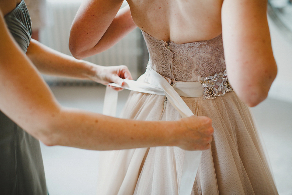 A Blush Pink Watters Wtoo Dress for an Elegant Wedding at Iscoyd Park. Photography by Haydn Rydings.