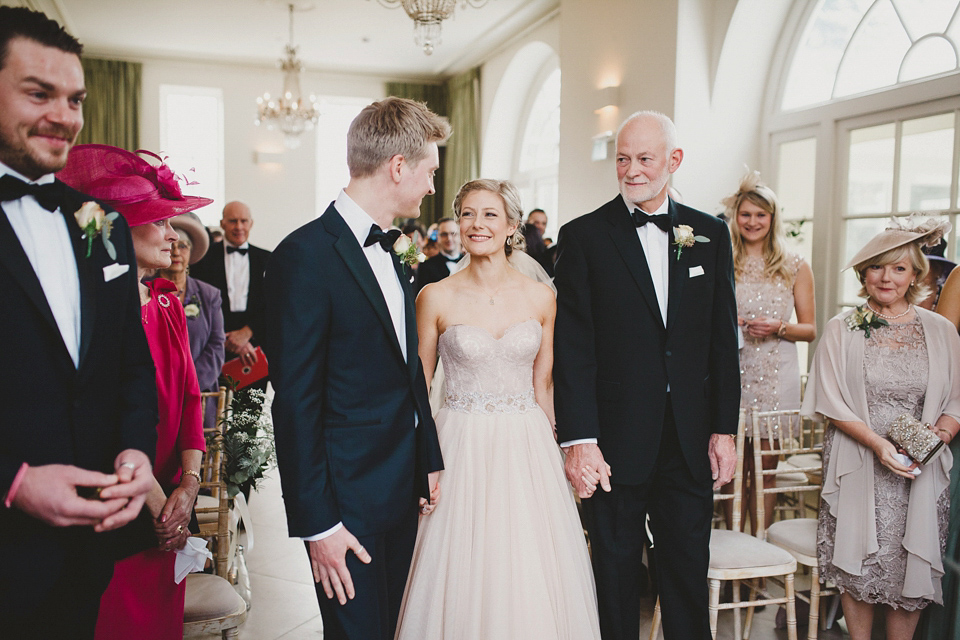 A Blush Pink Watters Wtoo Dress for an Elegant Wedding at Iscoyd Park. Photography by Haydn Rydings.