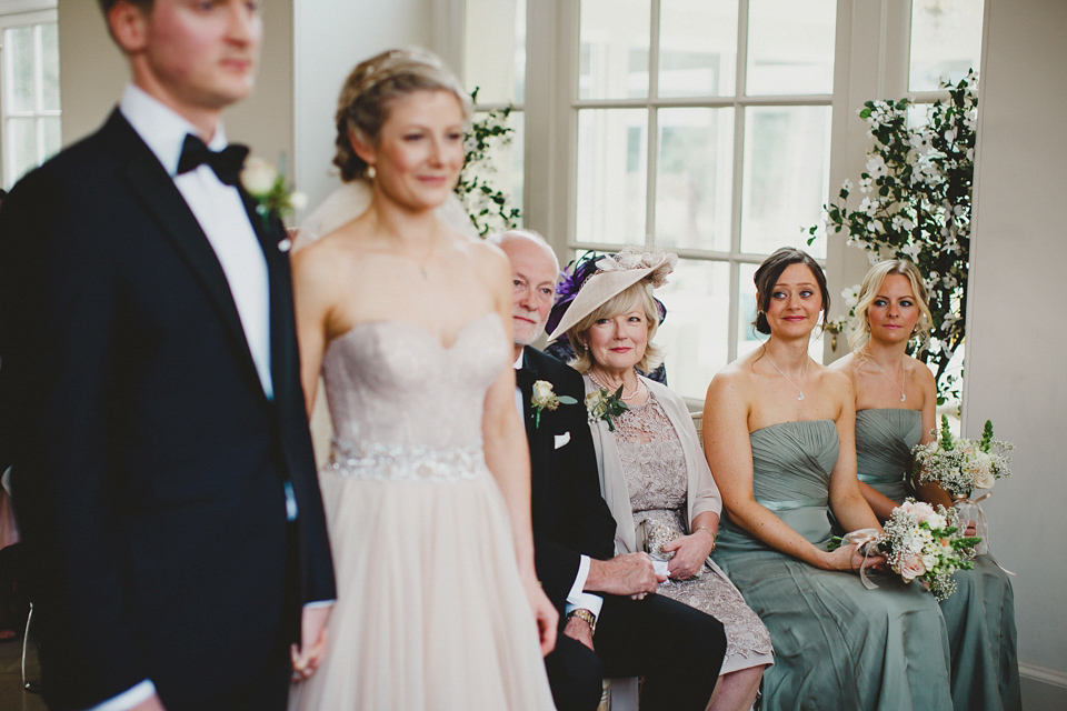 A Blush Pink Watters Wtoo Dress for an Elegant Wedding at Iscoyd Park. Photography by Haydn Rydings.