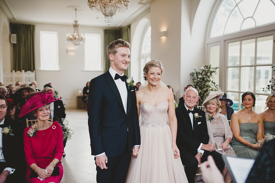 A Blush Pink Watters Wtoo Dress for an Elegant Wedding at Iscoyd Park. Photography by Haydn Rydings.