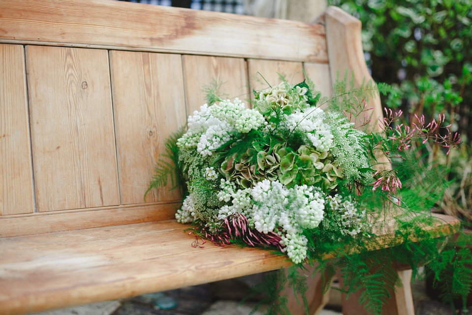 The wedding of Sinclair Seller, co-founder of Maids to Measure. Sinclair had 13 bridesmaids for her laid-back and glamorous British backyard wedding. Photography by Claire Graham and Lucy Davenport.