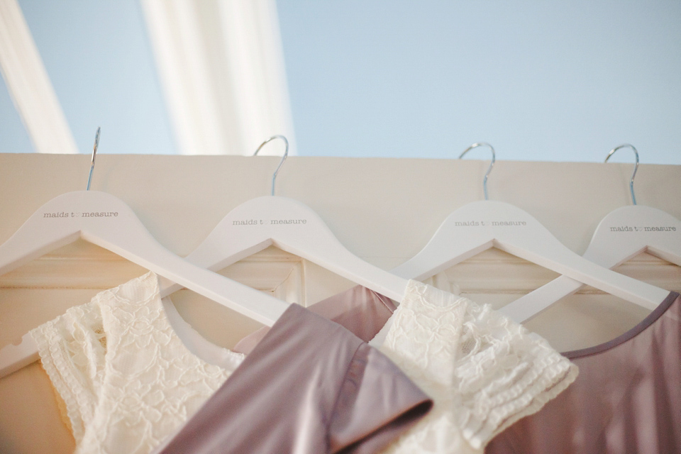 The wedding of Sinclair Seller, co-founder of Maids to Measure. Sinclair had 13 bridesmaids for her laid-back and glamorous British backyard wedding. Photography by Claire Graham and Lucy Davenport.