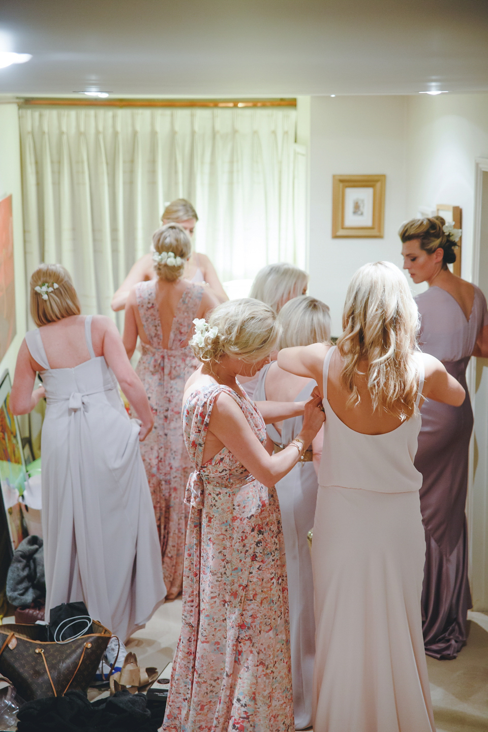 The wedding of Sinclair Seller, co-founder of Maids to Measure. Sinclair had 13 bridesmaids for her laid-back and glamorous British backyard wedding. Photography by Claire Graham and Lucy Davenport.