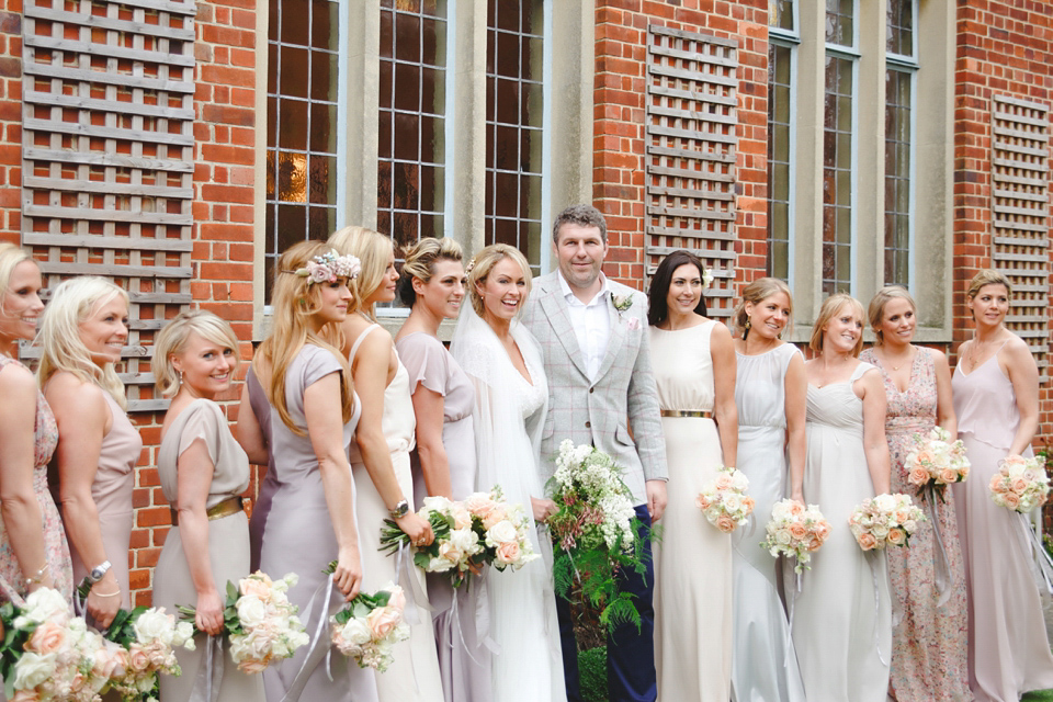 The wedding of Sinclair Seller, co-founder of Maids to Measure. Sinclair had 13 bridesmaids for her laid-back and glamorous British backyard wedding. Photography by Claire Graham and Lucy Davenport.