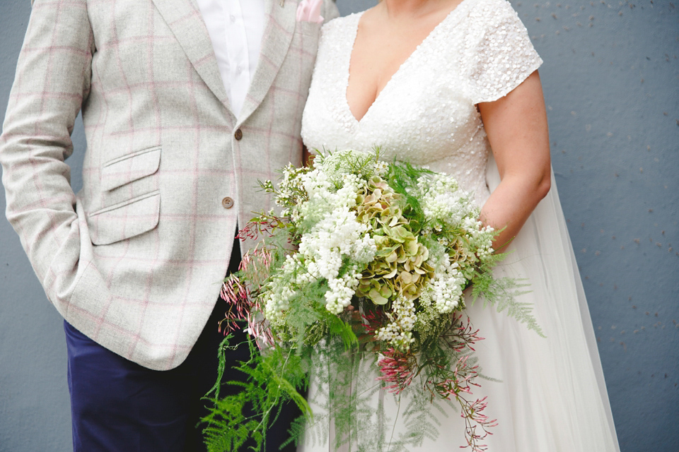 The wedding of Sinclair Seller, co-founder of Maids to Measure. Sinclair had 13 bridesmaids for her laid-back and glamorous British backyard wedding. Photography by Claire Graham and Lucy Davenport.