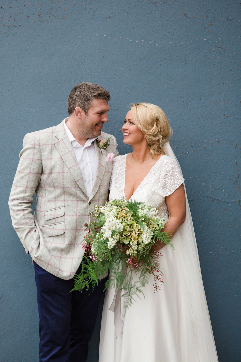 The wedding of Sinclair Seller, co-founder of Maids to Measure. Sinclair had 13 bridesmaids for her laid-back and glamorous British backyard wedding. Photography by Claire Graham and Lucy Davenport.