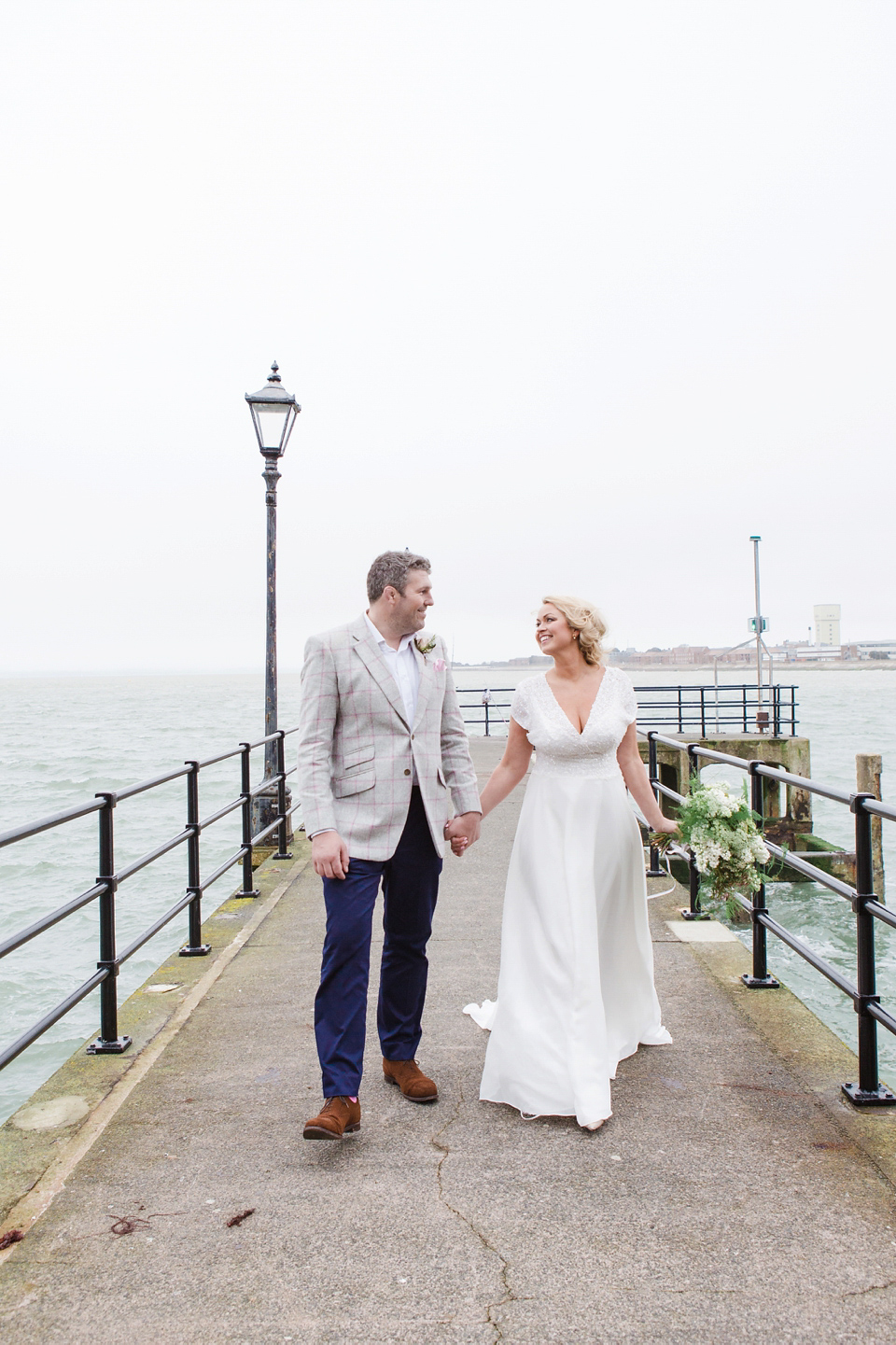 The wedding of Sinclair Seller, co-founder of Maids to Measure. Sinclair had 13 bridesmaids for her laid-back and glamorous British backyard wedding. Photography by Claire Graham and Lucy Davenport.