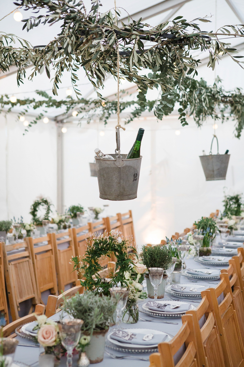 The wedding of Sinclair Seller, co-founder of Maids to Measure. Sinclair had 13 bridesmaids for her laid-back and glamorous British backyard wedding. Photography by Claire Graham and Lucy Davenport.