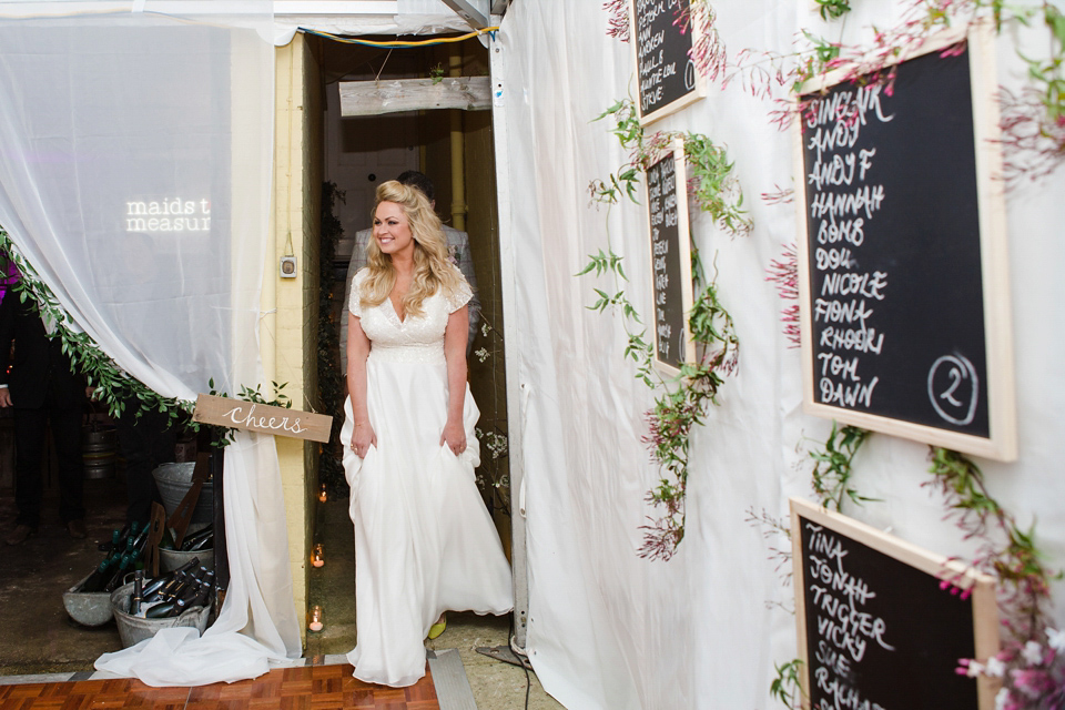 The wedding of Sinclair Seller, co-founder of Maids to Measure. Sinclair had 13 bridesmaids for her laid-back and glamorous British backyard wedding. Photography by Claire Graham and Lucy Davenport.