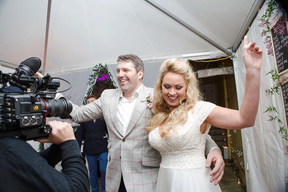 The wedding of Sinclair Seller, co-founder of Maids to Measure. Sinclair had 13 bridesmaids for her laid-back and glamorous British backyard wedding. Photography by Claire Graham and Lucy Davenport.