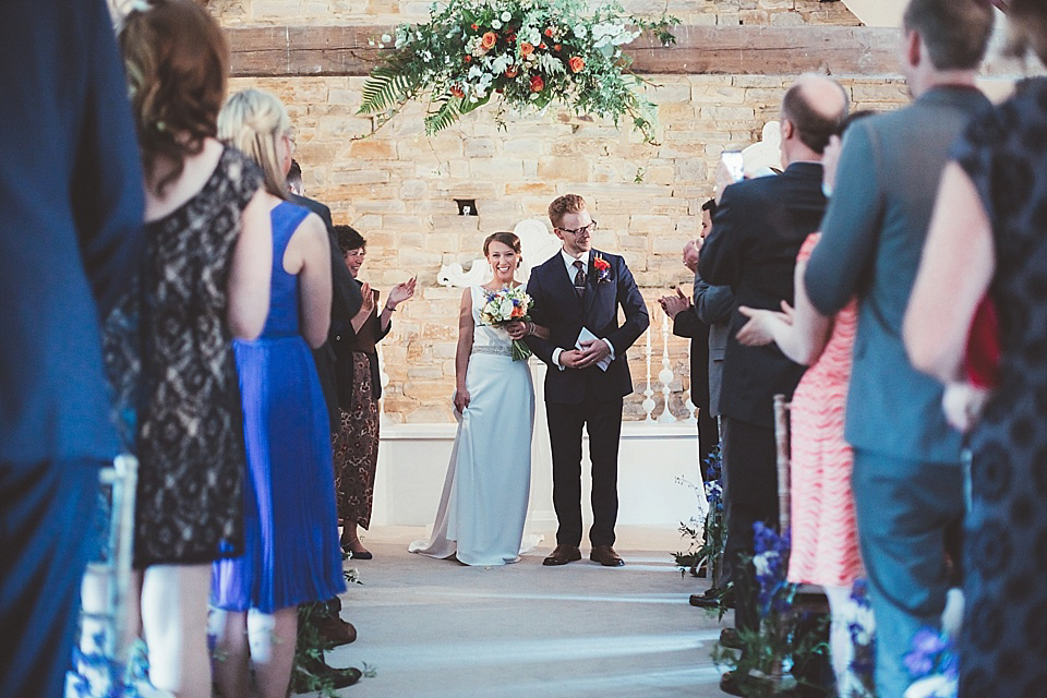 An Elegant Jesús Peiró Gown for an Indian Inspired Barn Wedding. Photography by Philippa James. An Elegant Jesús Peiró Gown for an Indian Inspired Barn Wedding. Photography by Philippa James.
