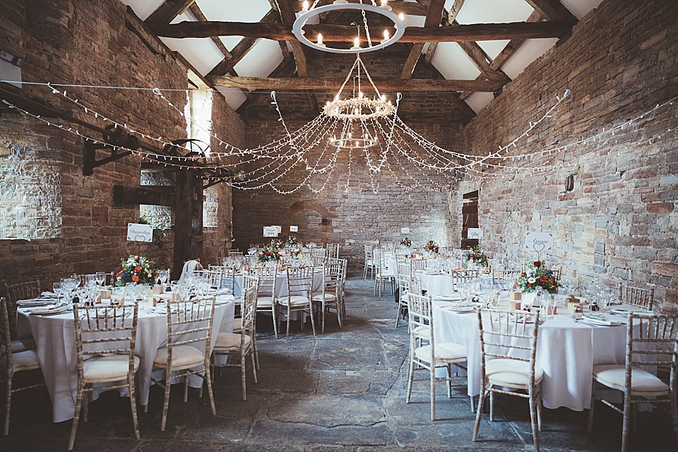 An Elegant Jesús Peiró Gown for an Indian Inspired Barn Wedding. Photography by Philippa James. An Elegant Jesús Peiró Gown for an Indian Inspired Barn Wedding. Photography by Philippa James.