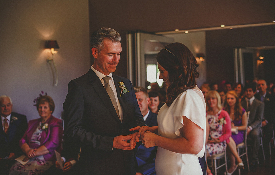 A Backless David Fielden Gown for a Travel Inspired Summer Wedding. Photography by Howell Jones.