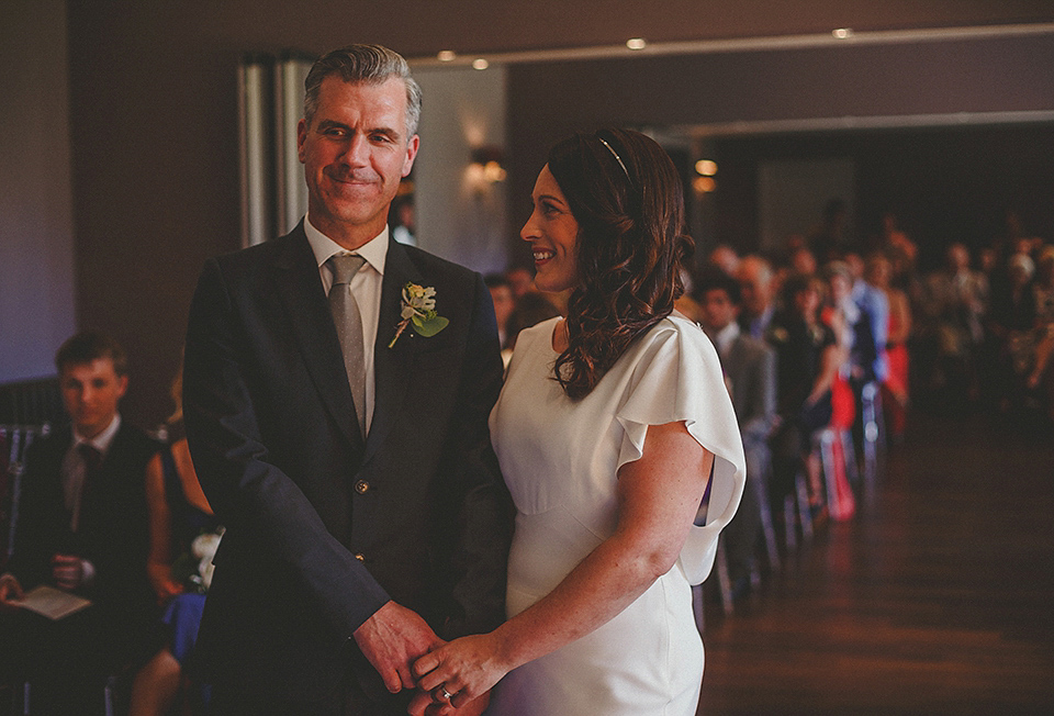 A Backless David Fielden Gown for a Travel Inspired Summer Wedding. Photography by Howell Jones.