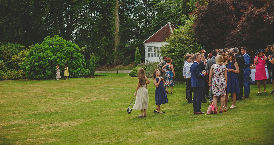 A Backless David Fielden Gown for a Travel Inspired Summer Wedding. Photography by Howell Jones.