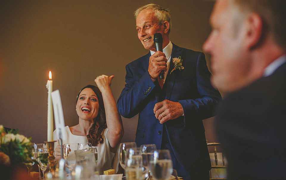 A Backless David Fielden Gown for a Travel Inspired Summer Wedding. Photography by Howell Jones.