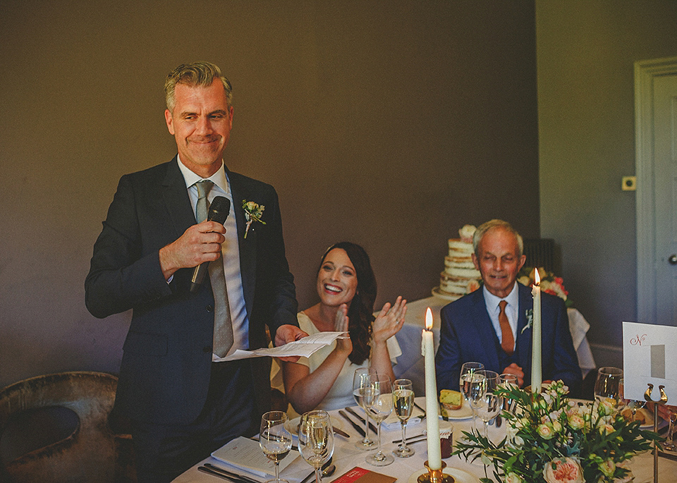 A Backless David Fielden Gown for a Travel Inspired Summer Wedding. Photography by Howell Jones.