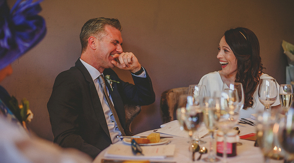 A Backless David Fielden Gown for a Travel Inspired Summer Wedding. Photography by Howell Jones.