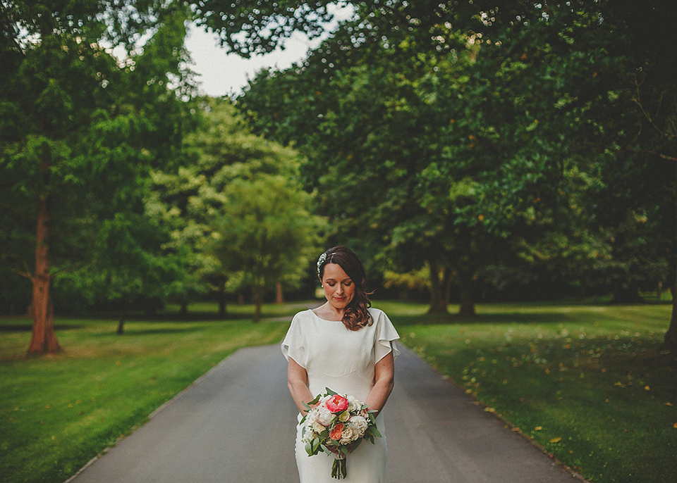 A Backless David Fielden Gown for a Travel Inspired Summer Wedding. Photography by Howell Jones.