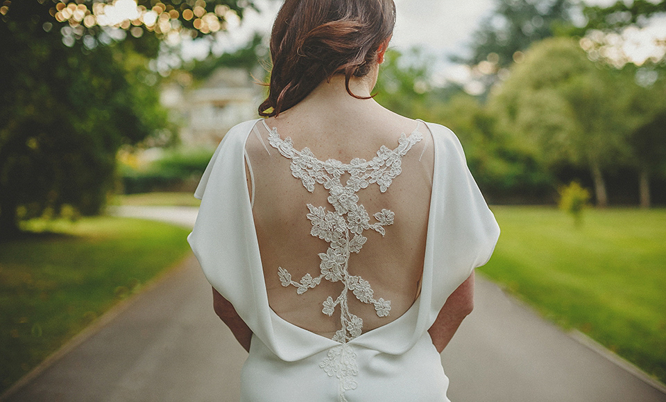 A Backless David Fielden Gown for a Travel Inspired Summer Wedding. Photography by Howell Jones.