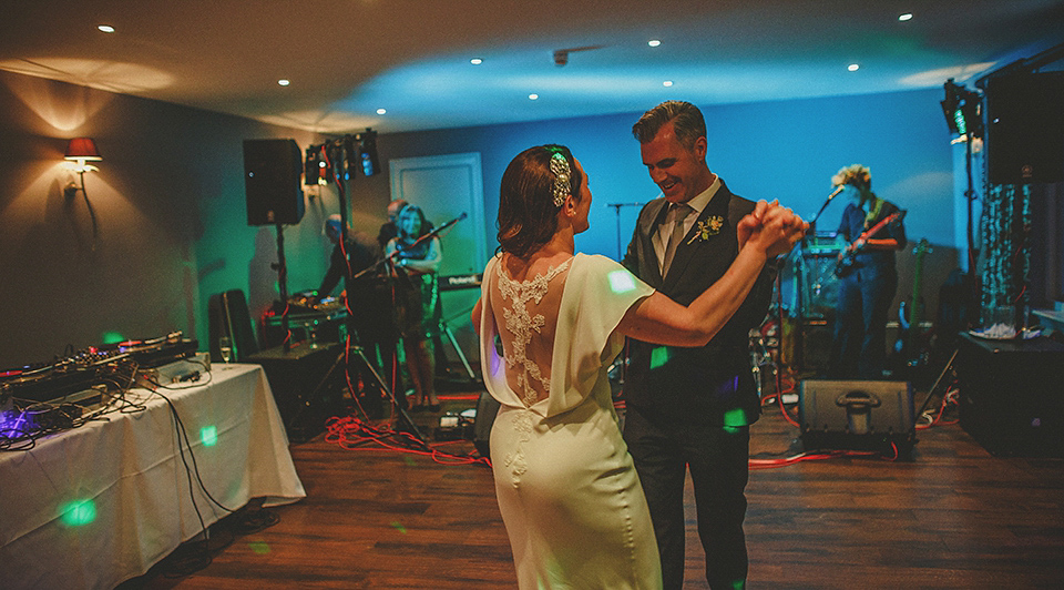 A Backless David Fielden Gown for a Travel Inspired Summer Wedding. Photography by Howell Jones.