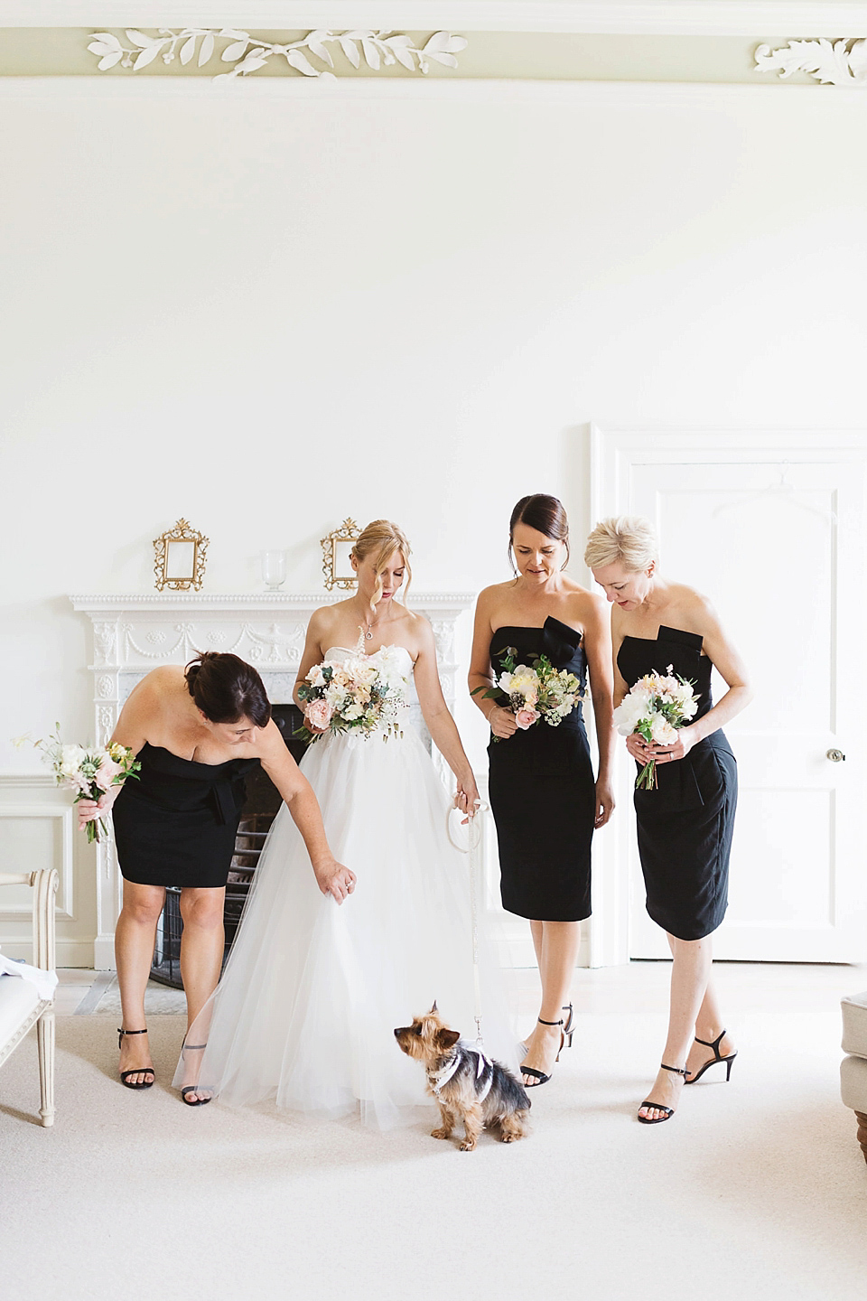 A Tulle Gown and Bridesmaids in Black for an Elegant Travel Inspired Wedding. Photography by Miss Gen.