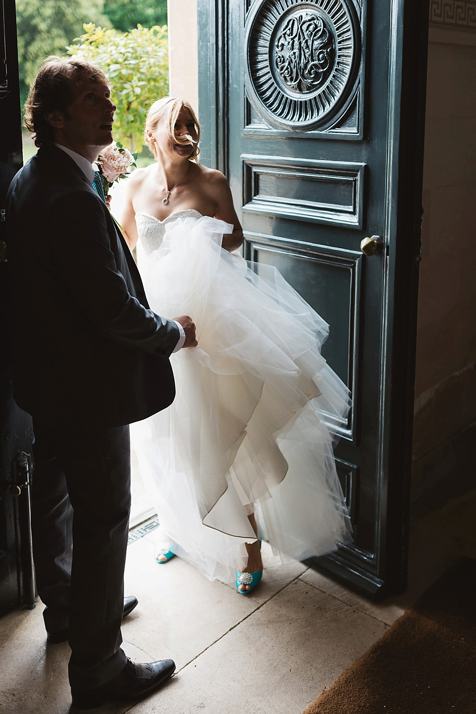 A Tulle Gown and Bridesmaids in Black for an Elegant Travel Inspired Wedding. Photography by Miss Gen.