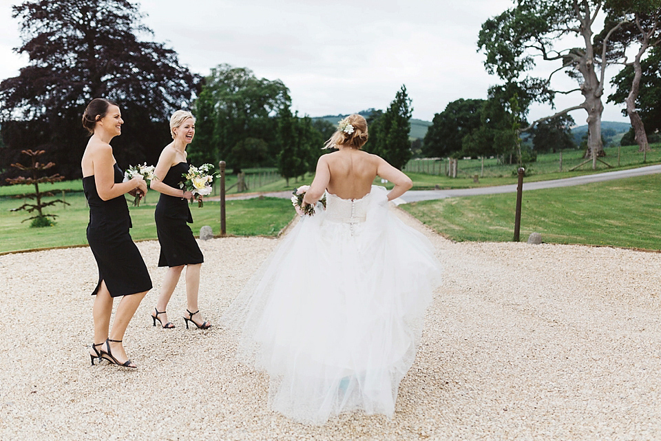 A Tulle Gown and Bridesmaids in Black for an Elegant Travel Inspired Wedding. Photography by Miss Gen.