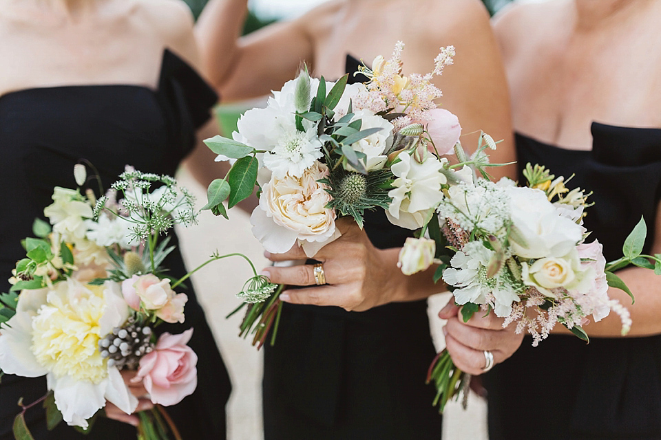 A Tulle Gown and Bridesmaids in Black for an Elegant Travel Inspired Wedding. Photography by Miss Gen.