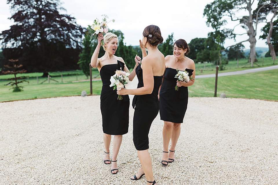A Tulle Gown and Bridesmaids in Black for an Elegant Travel Inspired Wedding. Photography by Miss Gen.