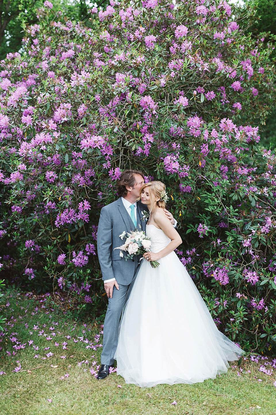 A Tulle Gown and Bridesmaids in Black for an Elegant Travel Inspired Wedding. Photography by Miss Gen.