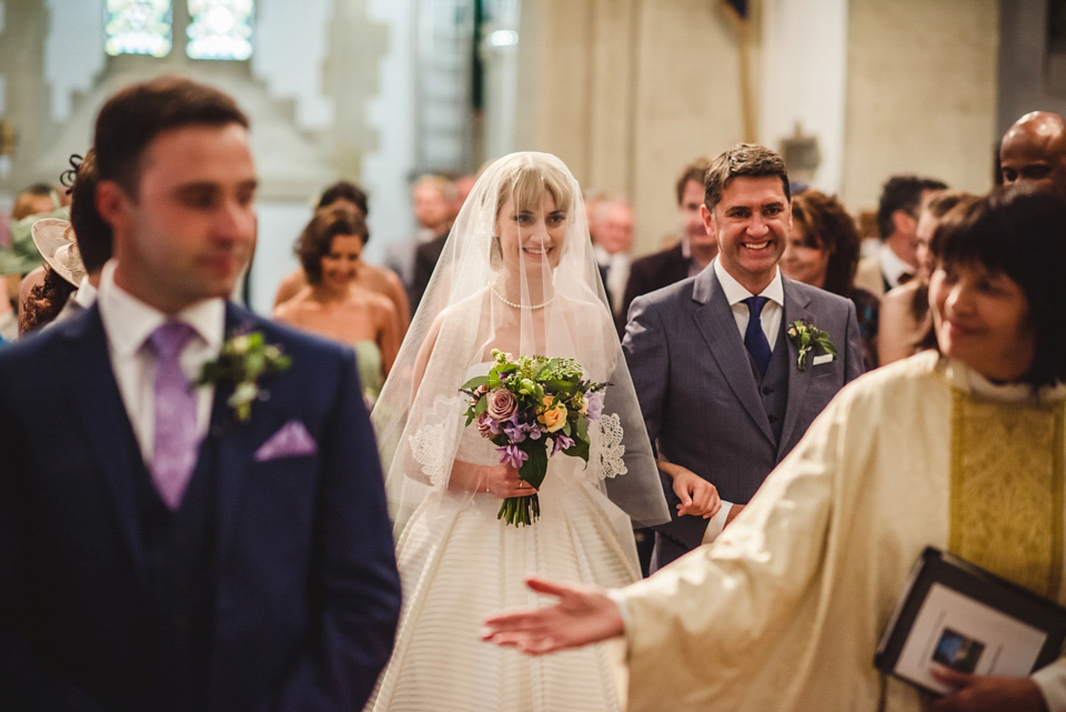 Green wedding shoes and a Jesus Peiro gown for this elegant wedding held at Fetcham Park in Surrey. Photography by Sophie Duckworth.