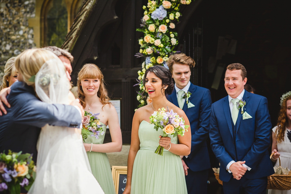 Green wedding shoes and a Jesus Peiro gown for this elegant wedding held at Fetcham Park in Surrey. Photography by Sophie Duckworth.