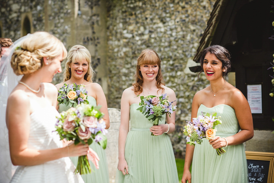 Green wedding shoes and a Jesus Peiro gown for this elegant wedding held at Fetcham Park in Surrey. Photography by Sophie Duckworth.