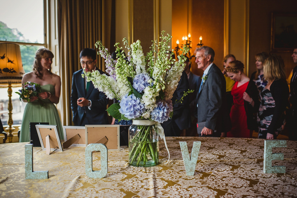 Green wedding shoes and a Jesus Peiro gown for this elegant wedding held at Fetcham Park in Surrey. Photography by Sophie Duckworth.