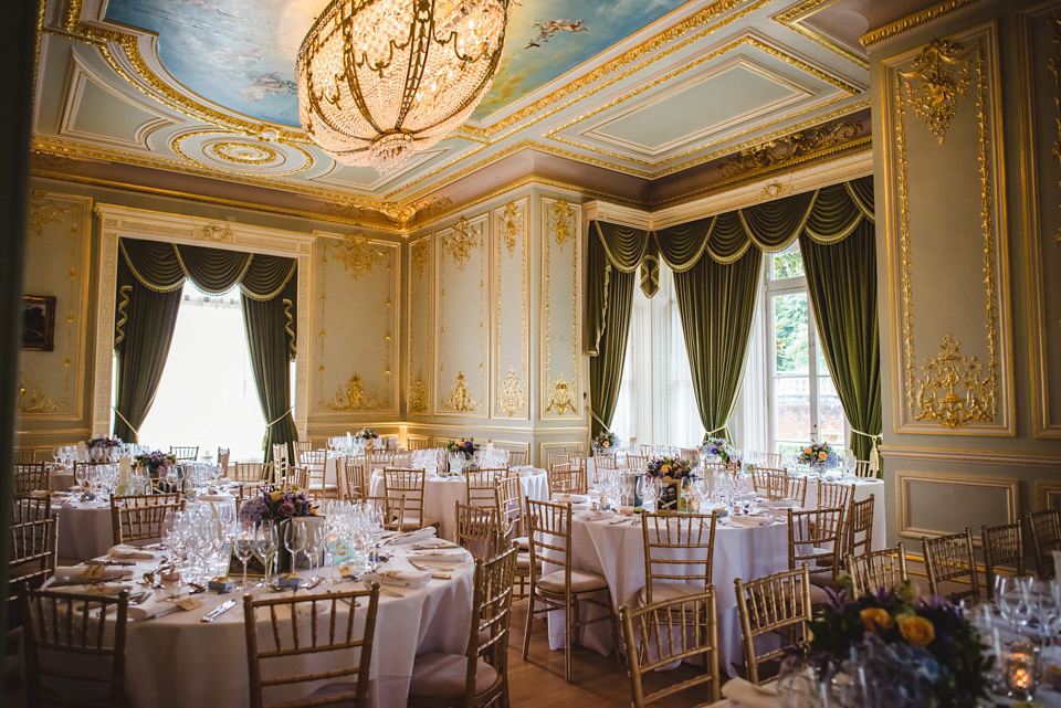 Green wedding shoes and a Jesus Peiro gown for this elegant wedding held at Fetcham Park in Surrey. Photography by Sophie Duckworth.