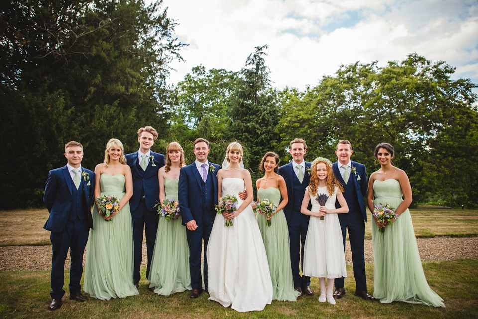 Green wedding shoes and a Jesus Peiro gown for this elegant wedding held at Fetcham Park in Surrey. Photography by Sophie Duckworth.