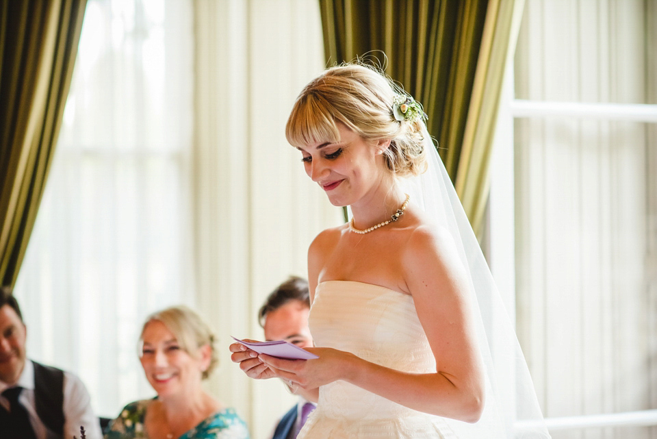 Green wedding shoes and a Jesus Peiro gown for this elegant wedding held at Fetcham Park in Surrey. Photography by Sophie Duckworth.