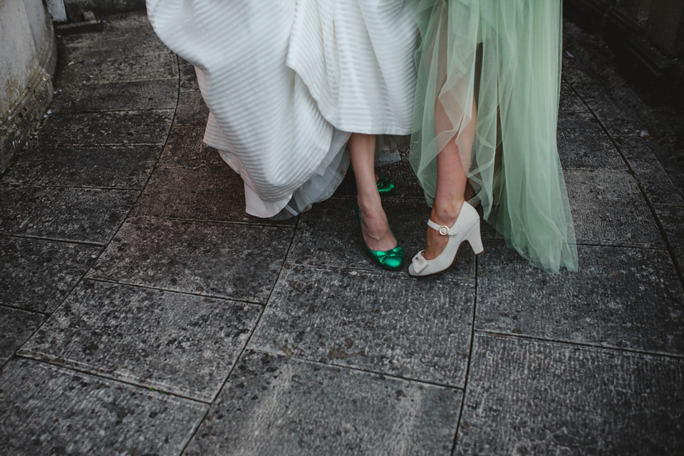 Green wedding shoes and a Jesus Peiro gown for this elegant wedding held at Fetcham Park in Surrey. Photography by Sophie Duckworth.