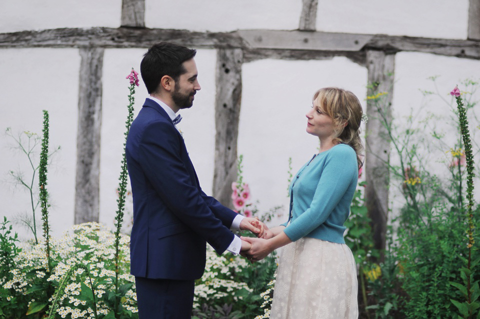 Handmade Rings, Wildflowers and a Yoana Baraschi Gown. Photography by Ella Ruth.