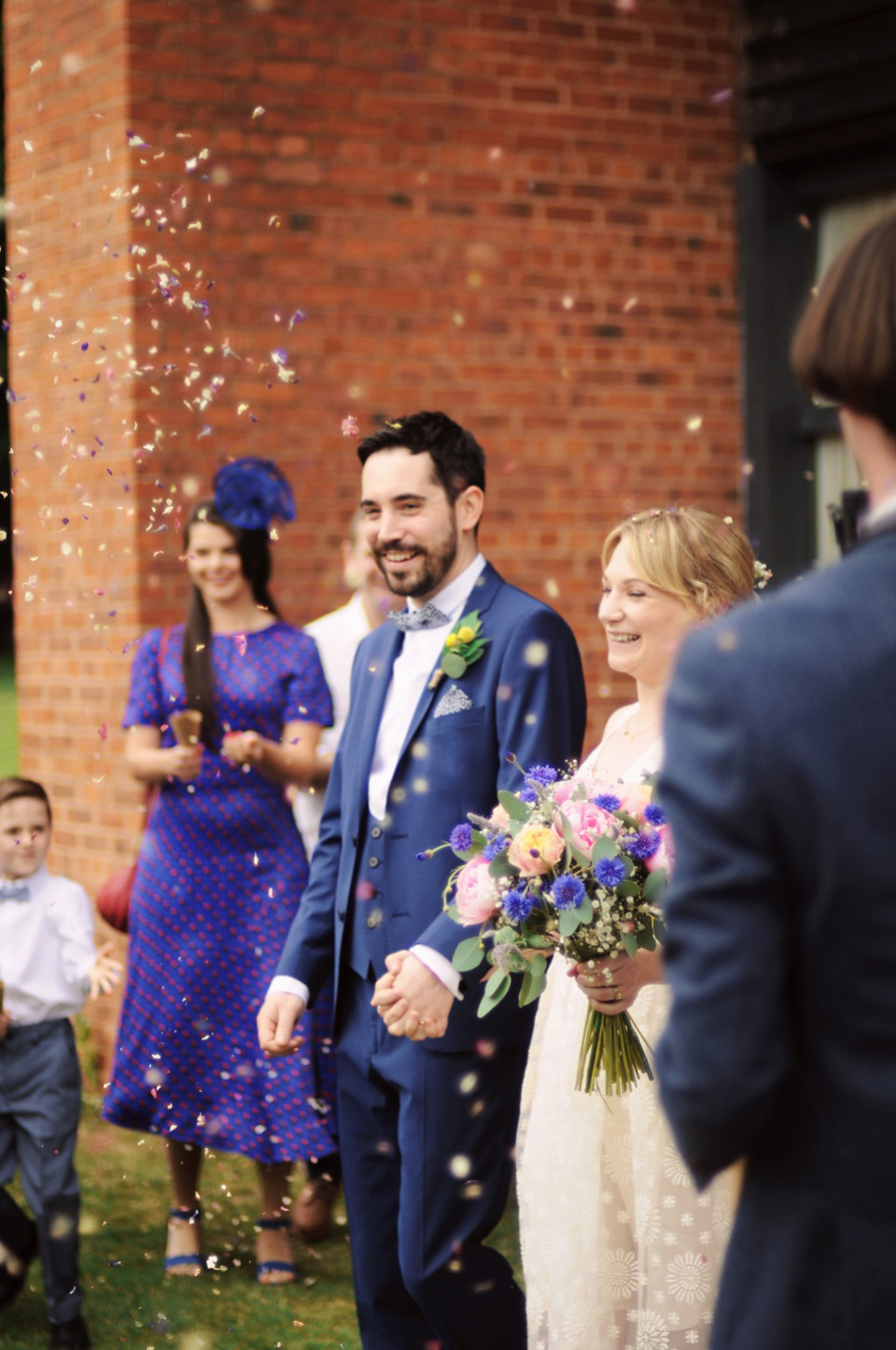 Handmade Rings, Wildflowers and a Yoana Baraschi Gown. Photography by Ella Ruth.