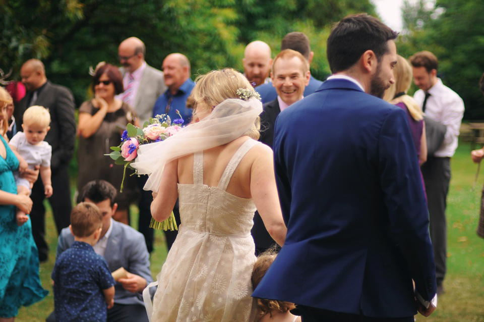 Handmade Rings, Wildflowers and a Yoana Baraschi Gown. Photography by Ella Ruth.