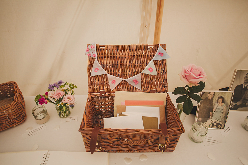 Wildflowers, a meadow, and and elegant Jesus Peiro gown for a handmade summer fete and festival inspired wedding. Photography by Simon Fazackarley.