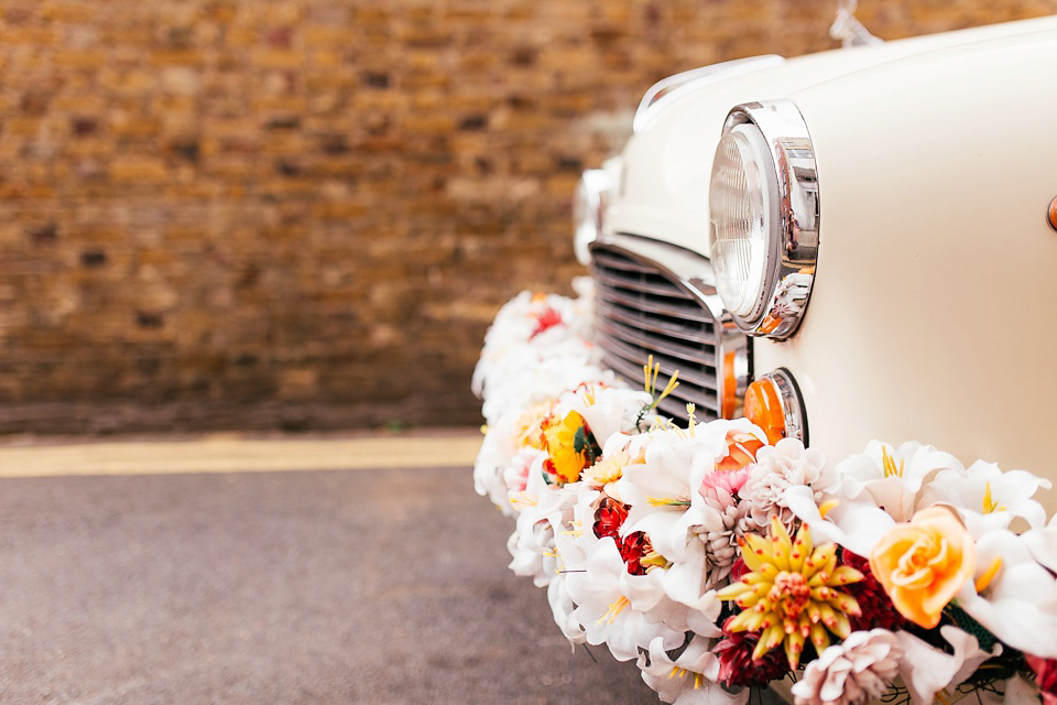 A sequin wedding dress by Karen Willis Holmes for a glamorous and literary inspired London Wedidng. Phtoography by Joanna Nicole.